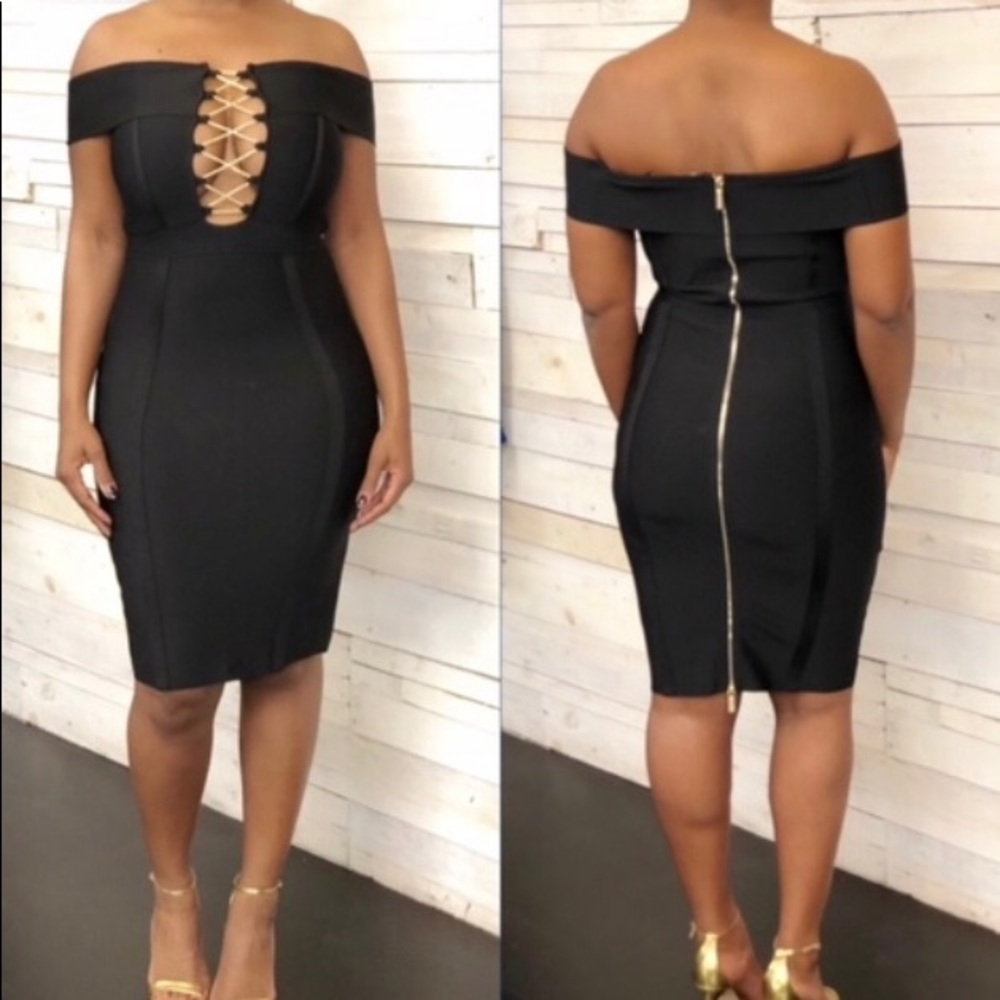 Black bandage dress with gold chain embellishment